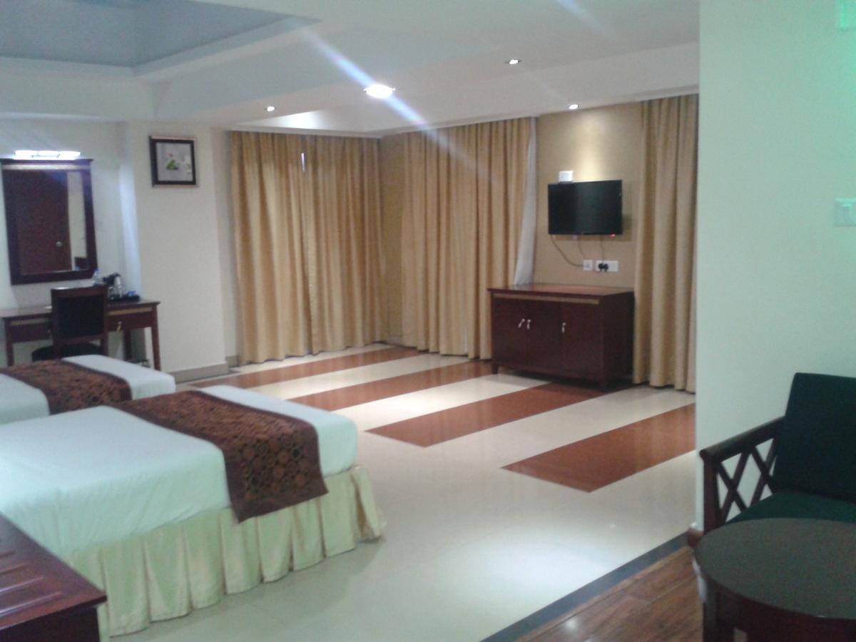 Hotel Hiton Perintalmanna Habitación foto