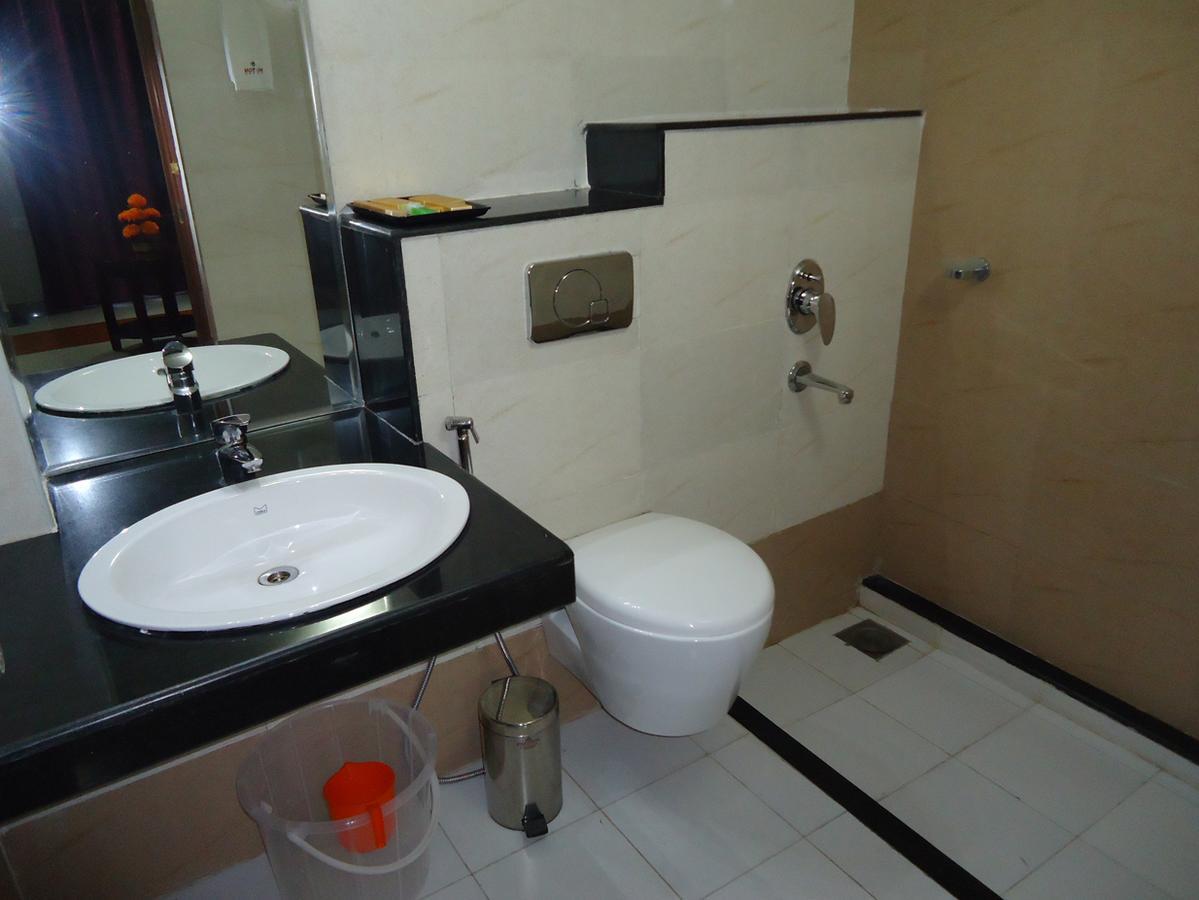 Hotel Hiton Perintalmanna Habitación foto